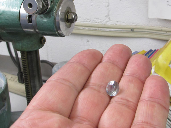 Tim Bondy holds his newly faceted gemstone from Stoeckers